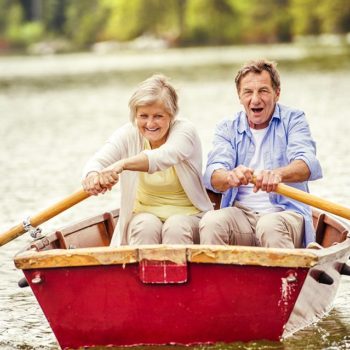 man and woman rowboating